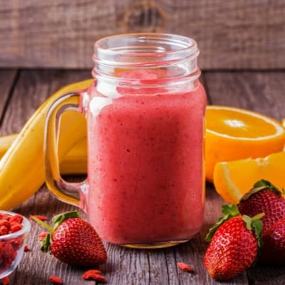 Blending smoothies with hand blender