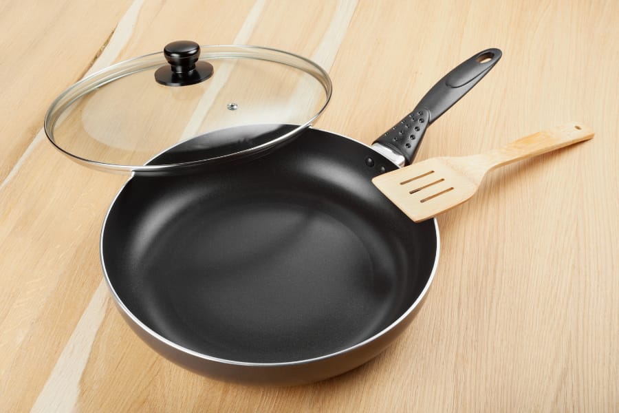 Handles and lids of non-stick cookware